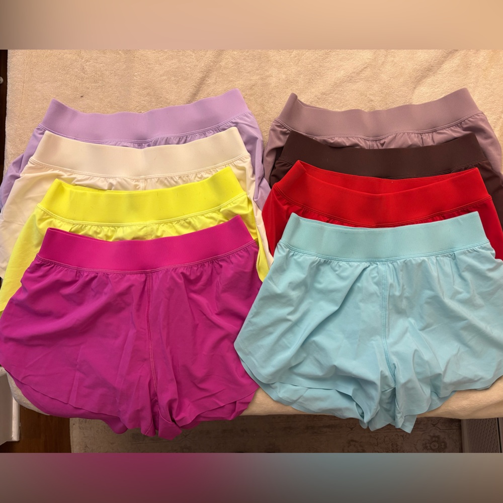 CRZ YOGA MID WAIST DOLPHIN 4in SHORTS